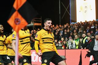 Padraig Amond celebrates after scoring Newport County's winning goal, a penalty, against Leicester City in the FA Cup, 2019