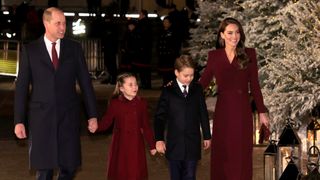 Prince William, Prince of Wales, Princess Charlotte of Wales and Prince George of Wales and Catherine, Princess of Wales attend the 'Together at Christmas' Carol Service