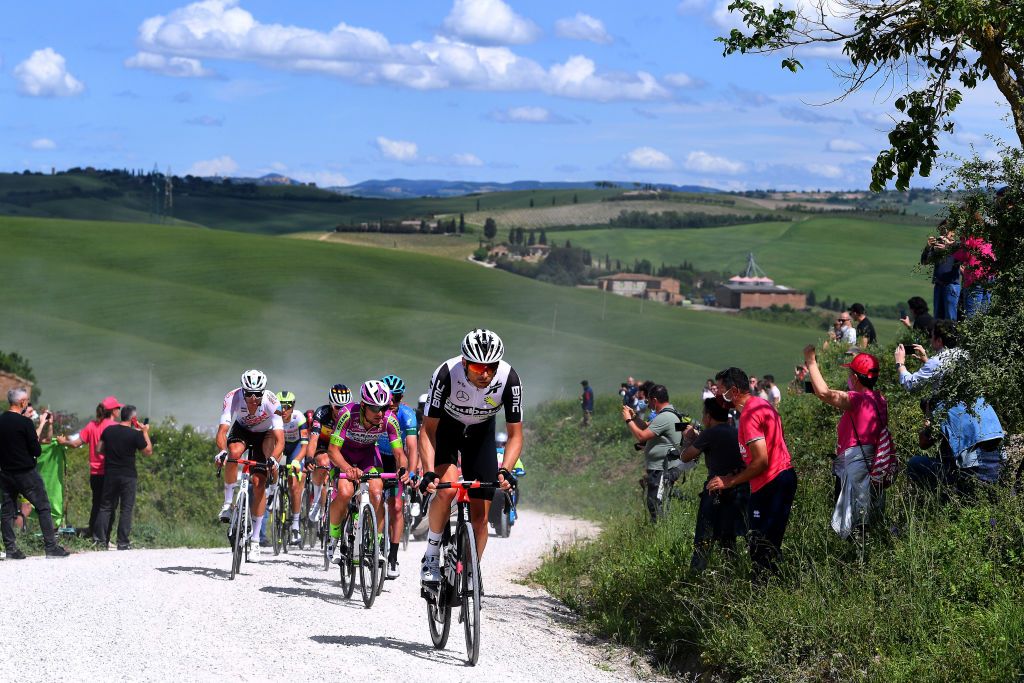 MONTALCINO ITALY MAY 19 Bertjan Lindeman of Netherlands and Team Qhubeka Assos Enrico Battaglin of Italy and Bardiani CSF Faizan Pro Team Lawrence Naesen of Belgium and AG2R Citren Team in breakaway during the 104th Giro dItalia 2021 Stage 12 a 162km stage from Perugia to Montalcino 554m Gravel Strokes Public Fans girodiitalia UCIworldtour Giro on May 19 2021 in Montalcino Italy Photo by Tim de WaeleGetty Images