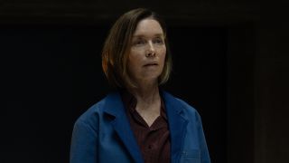 Sinatra wearing blue overshirt to speak with "Alex" in Paradise Season 2 Episode 7