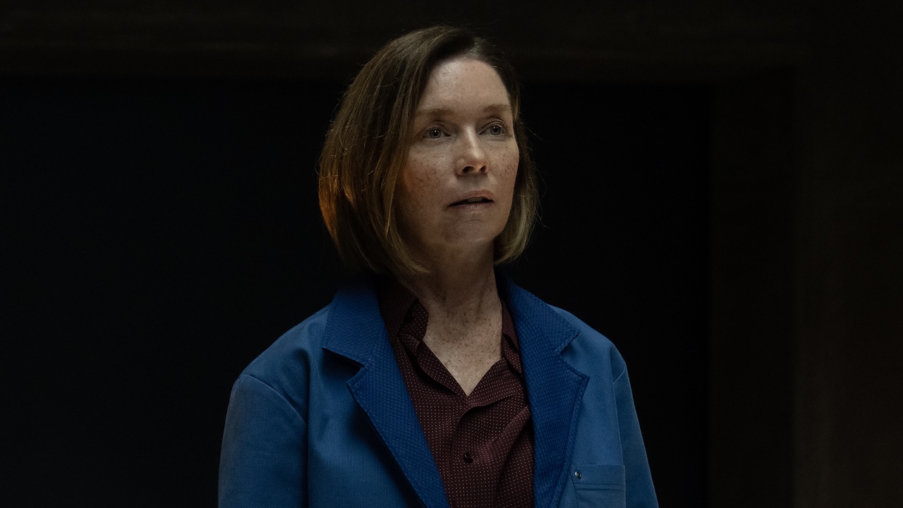 Sinatra wearing blue overshirt to speak with "Alex" in Paradise Season 2 Episode 7