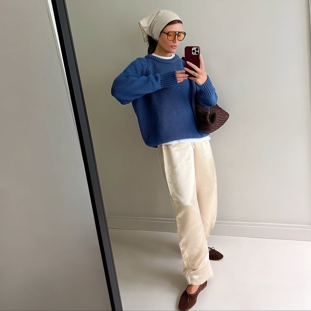 Blue chunky knit jumper, bandana, satin trousers and brown ballerina shoes.