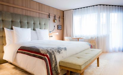 Bedroom at the Schweizerhof Hotel