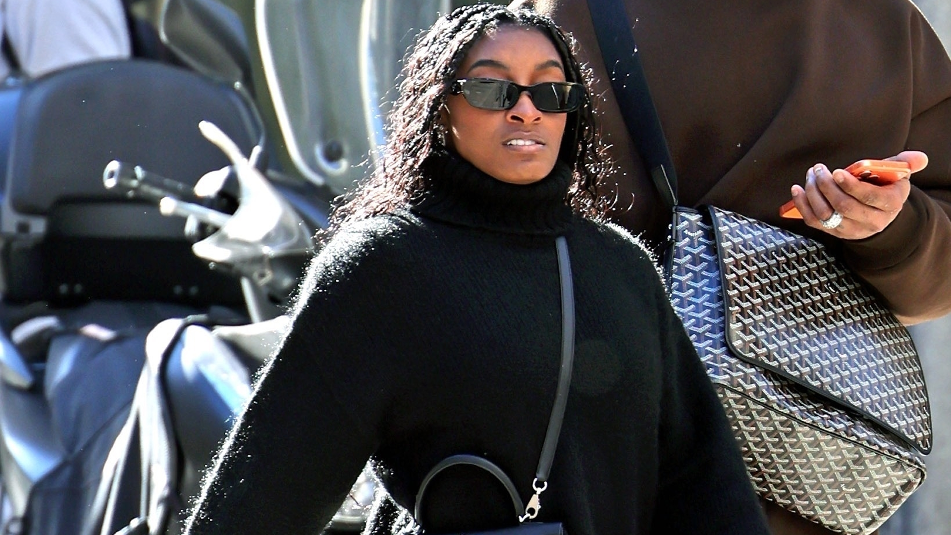 Simone Biles was spotted during the Winter Olympics in Milan wearing Nike sneakers and a Herm&egrave;s Kelly bag