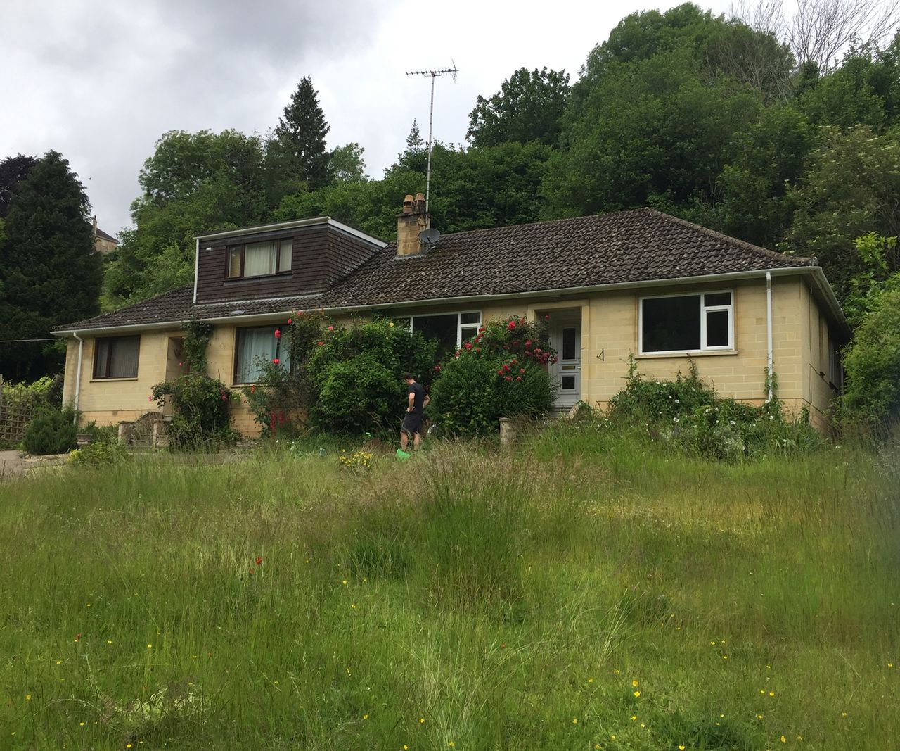 The before shot of a semi detached bungalow
