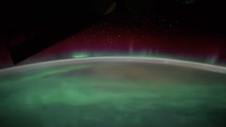 A still shot from Jonny Kim's space time-lapse of the aurora over Earth