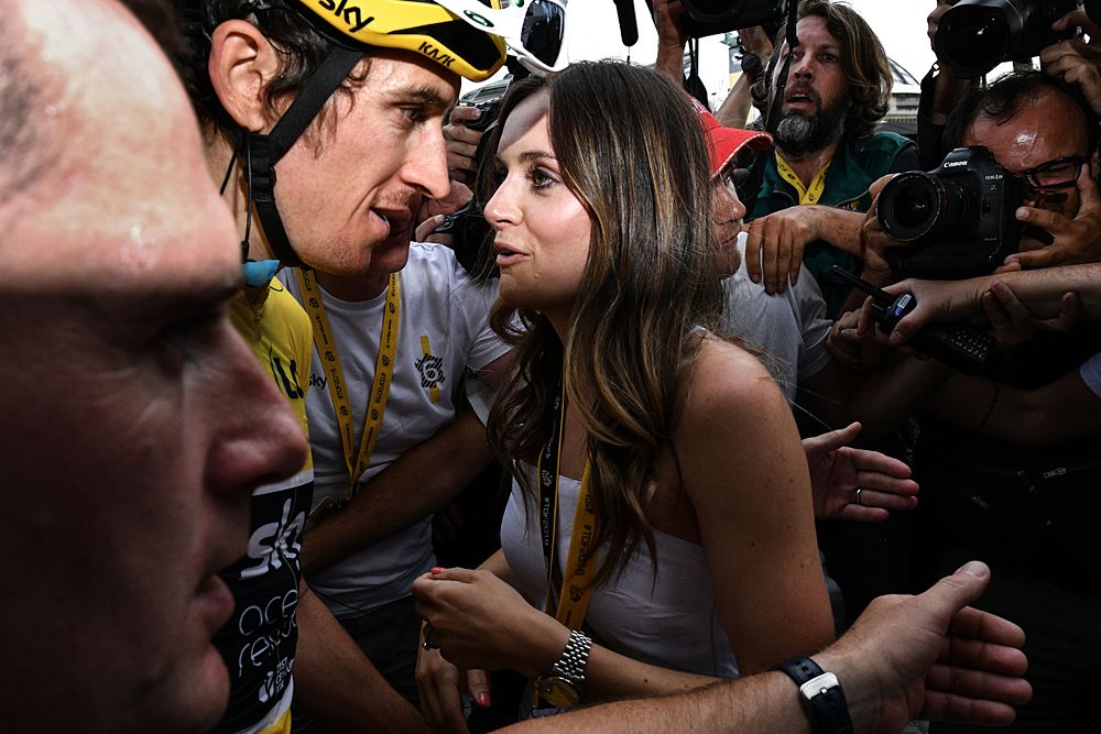 Geraint Thomas (Team Sky) celebrates his overall victory with his wife following stage 21 at the Tour de France