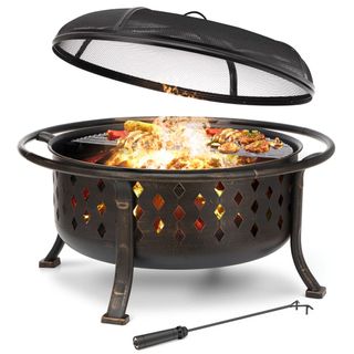 A lit Singlyfire 36 Inch Fire Pit with food