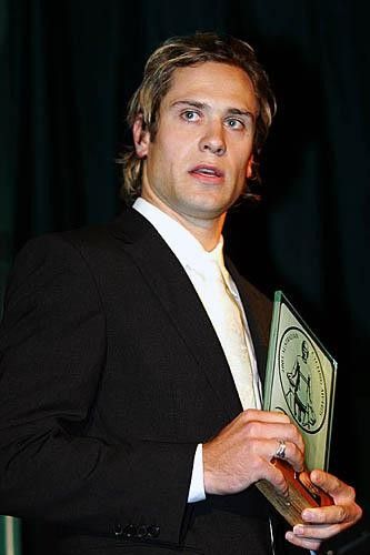 Ben Kersten accepts his award as male track cyclist of the year.