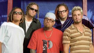 Korn posing for a photograph in the 1990s