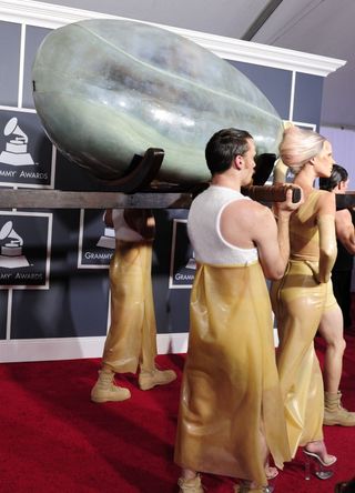 Lady GAGA walking the red carpet in an egg at the grammys