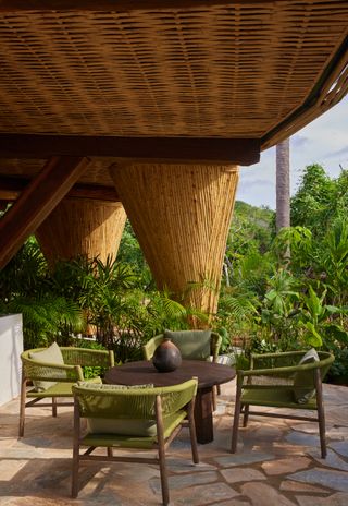 seating and tables in mexican jungle part of four seasons Naviva resort in mexico