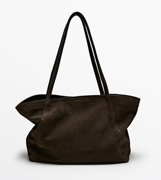 Image of brown suede handbag