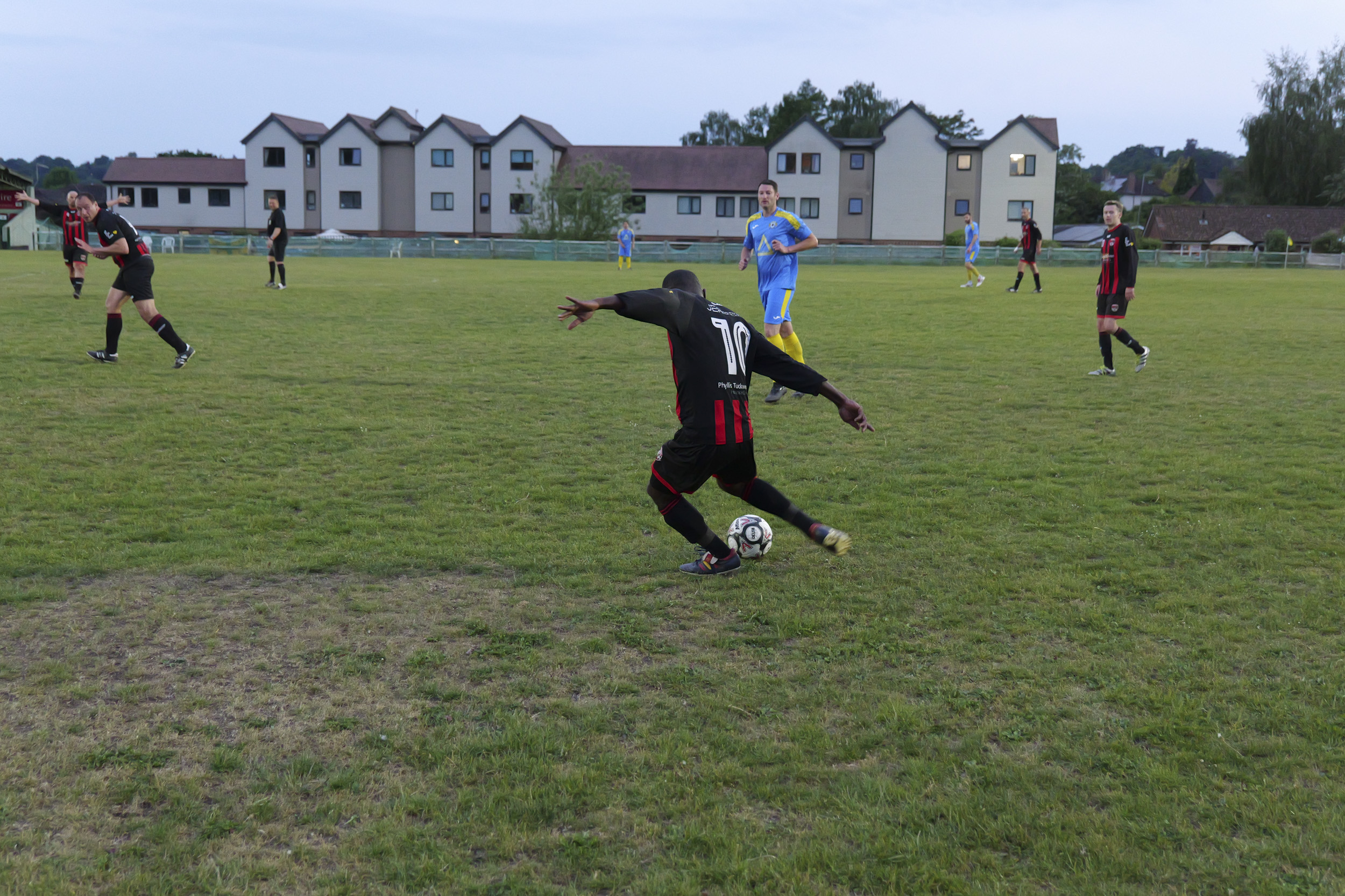 Panasonic Lumix S1 II sample gallery: footballers in action during game at last light