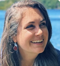 woman with brown hair smiling