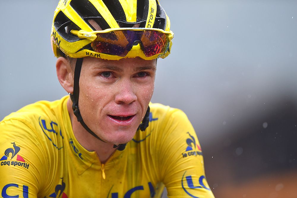 A happy Chris Froome only needs to finish Sunday in Paris to win his third Tour de France.