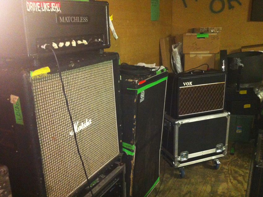 Matchless 120 Super Chief, Marshall cabinet (two are used), Ampeg bass amp, Vox AC15 combo amp.
