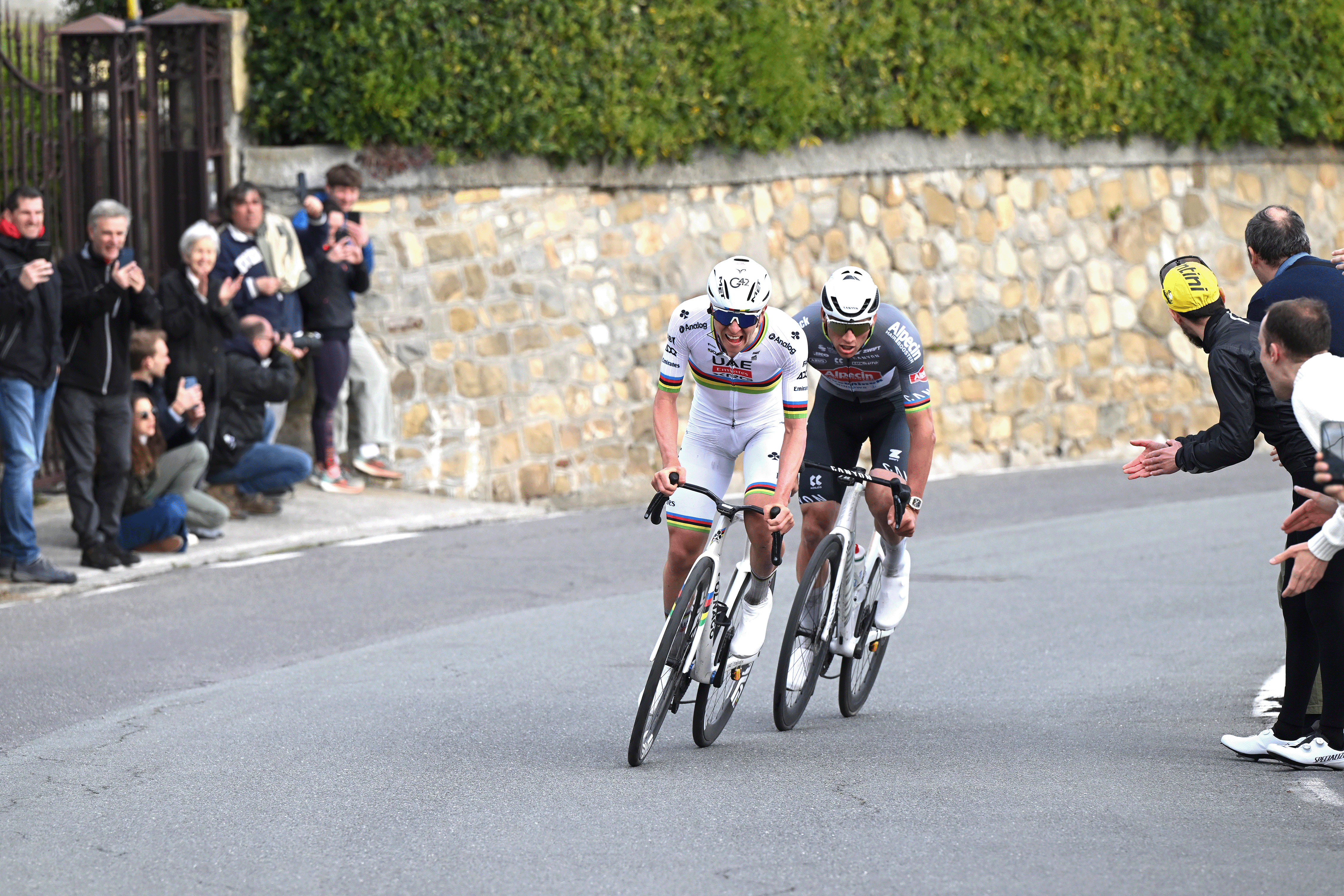 SANREMO, ITALY - MARCH 22: (L-R) Tadej Pogacar of Slovenia and Team UAE Team Emirates and Mathieu Van Der Poel of Netherlands and Team Alpecin – Deceuninck compete in the breakaway during the 116th Milano-Sanremo 2025 a 289km one day race from Pavia to Sanremo / #UCIWT / on March 22, 2025 in Sanremo, Italy. (Photo by Dario Belingheri/Getty Images)