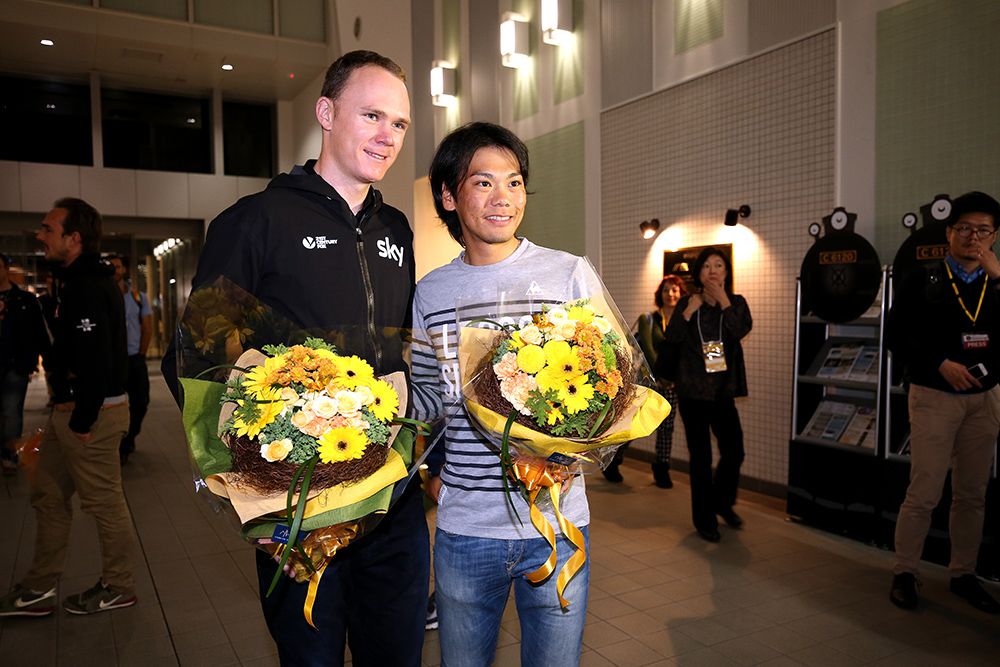 Chris Froome with Japanese rider Ayashiro