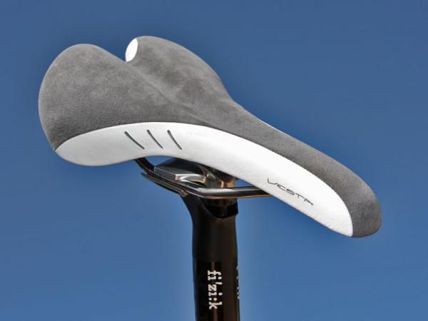 The new fi'zi:k Vesta women's-specific saddle incorporates a deep central channel to help relieve pressure on soft tissue.