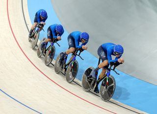 PARIS, FRANCE - AUGUST 06: Simone Consonni, Filippo Ganna, Francesco Lamon and Jonathan Milan of Team Italy compete during the Men&#039;s Team Pursuit - First Round on day eleven of the Olympic Games Paris 2024 at Saint-Quentin-en-Yvelines Velodrome on August 06, 2024 in Paris, France. (Photo by Alex Broadway/Getty Images)