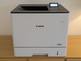 The Canon i-SENSYS LBP732Cdw printer on a desk