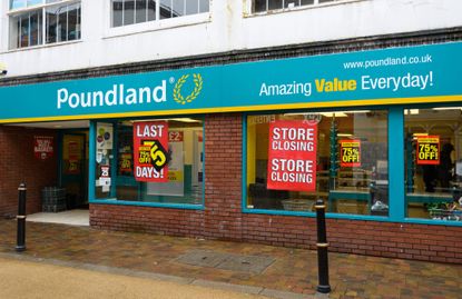 The frontage of a Poundland discount shop with closing down sale advertised in the window
