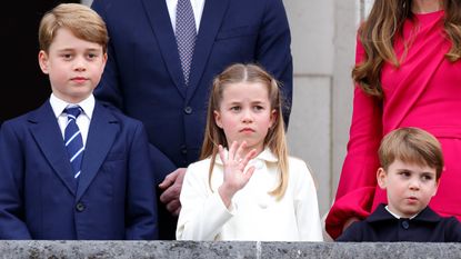 The family tradition Prince George, Charlotte and Louis could miss revealed. Seen here the three royals stand on the balcony of Buckingham Palace