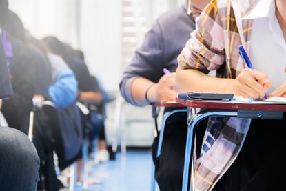 A close-up of students sitting their AS and A Levels exams