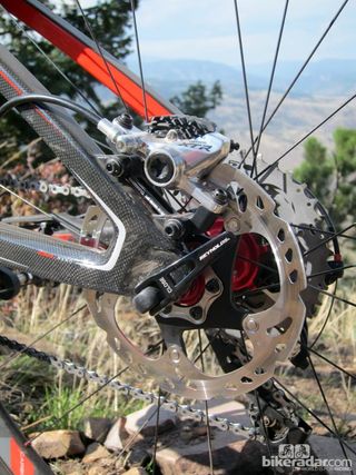 The XTR hydraulic disc brakes mount to IS-style tabs out back