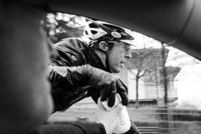 Chris Jones (UnitedHealthcare) comes back to the team car for a fresh bottle.