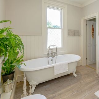 bathroom with wooden flooring