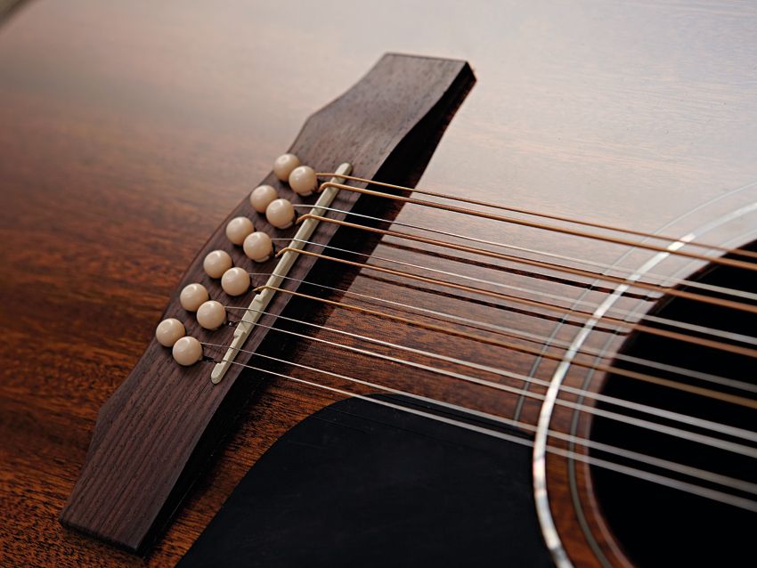 The finish on the D-125-12 shows off the lustrous grain of the mahogany top.