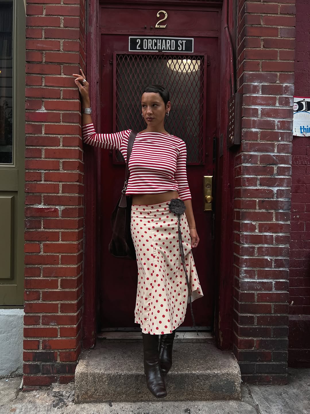woman wearing fall skirt outfit 2025