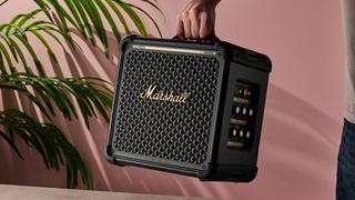 Man holding the Marshall Bromley 150