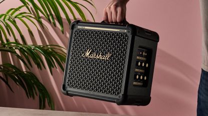 Man holding the Marshall Bromley 150