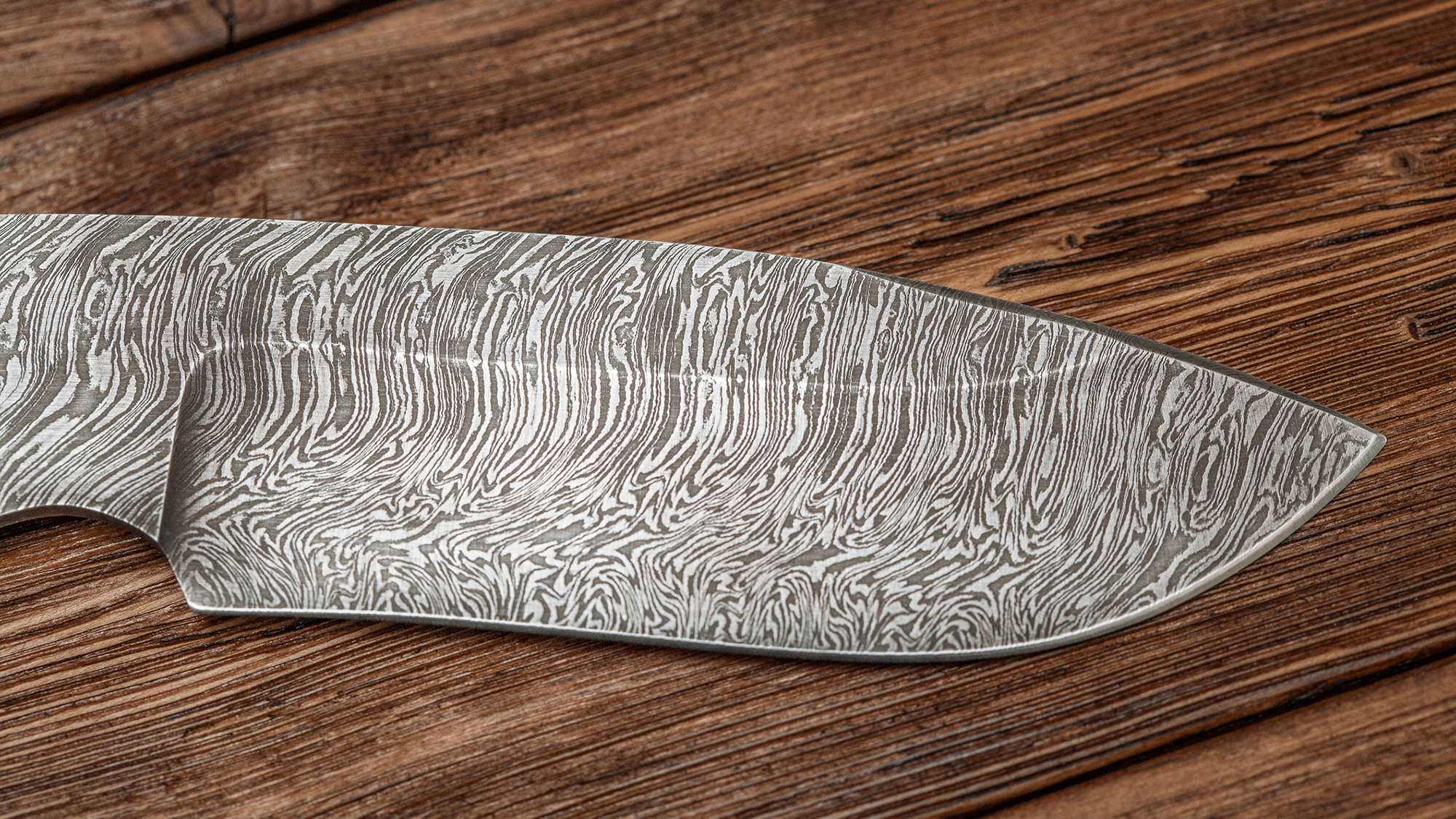 A close up of a striped knife