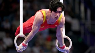 Chinese gymnast competing on rings