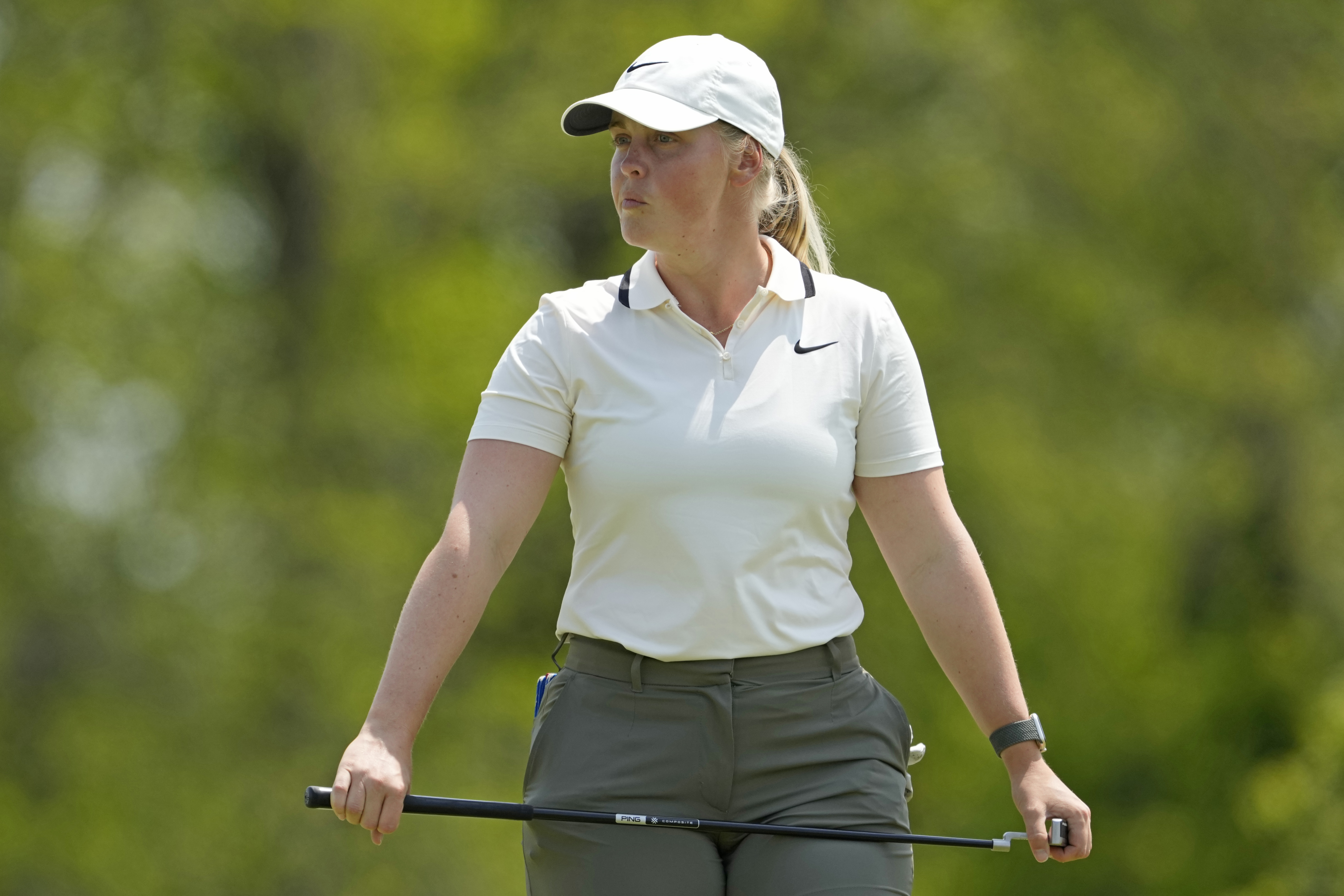 Maja Stark waits on the green to putt