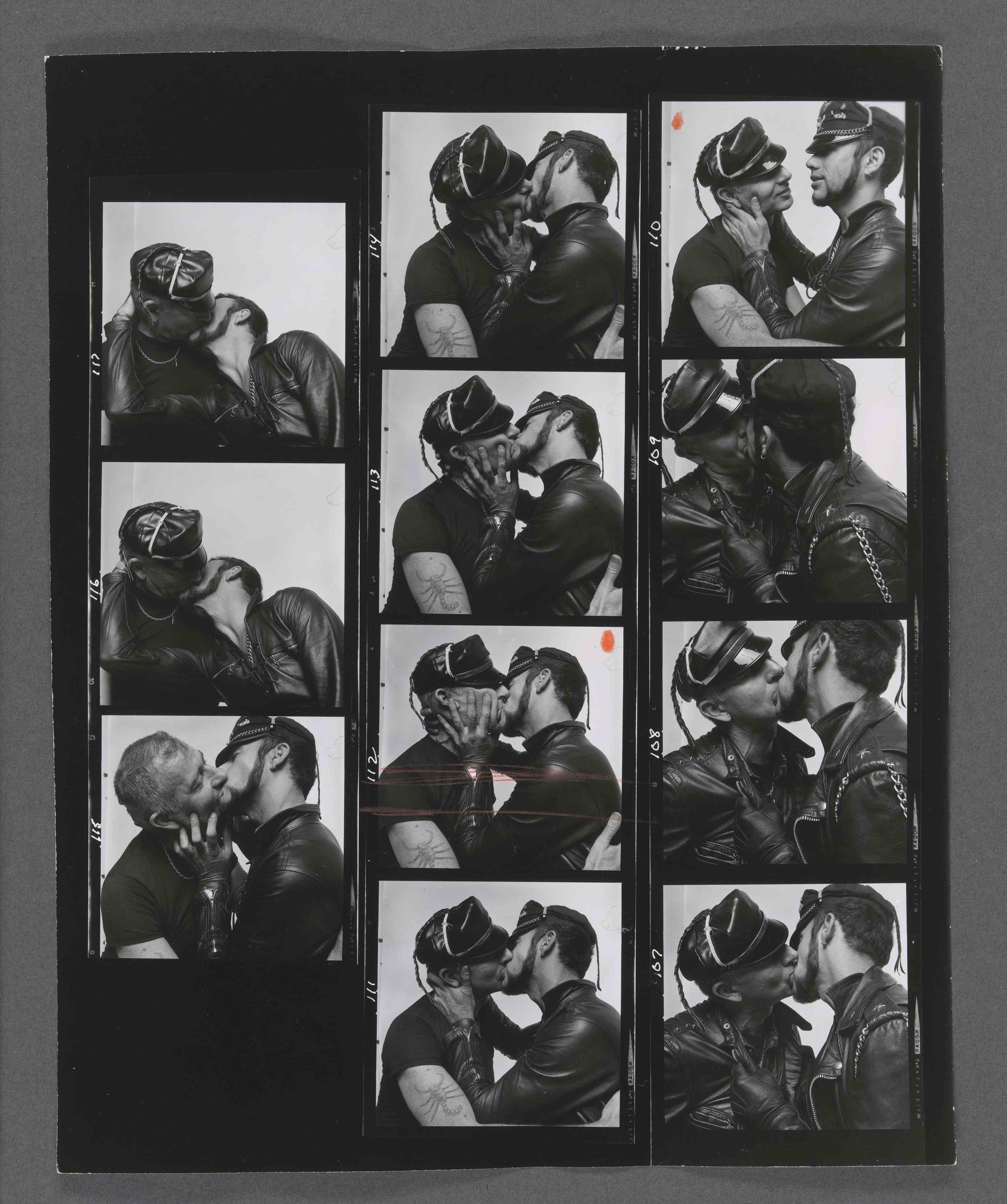 A black and white contact sheet of eleven frames in three columns showing two men in leather caps and jackets kissing and embracing in various poses against a plain white background.