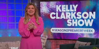 Kelly Clarkson laughing while hosting The Kelly Clarkson Show.