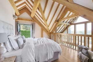 oak frame house with mezzanine bedroom and patio doors