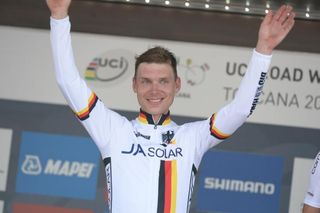 Germany's Tony Martin on the podium to receive the world champion's rainbow jersey and gold medal