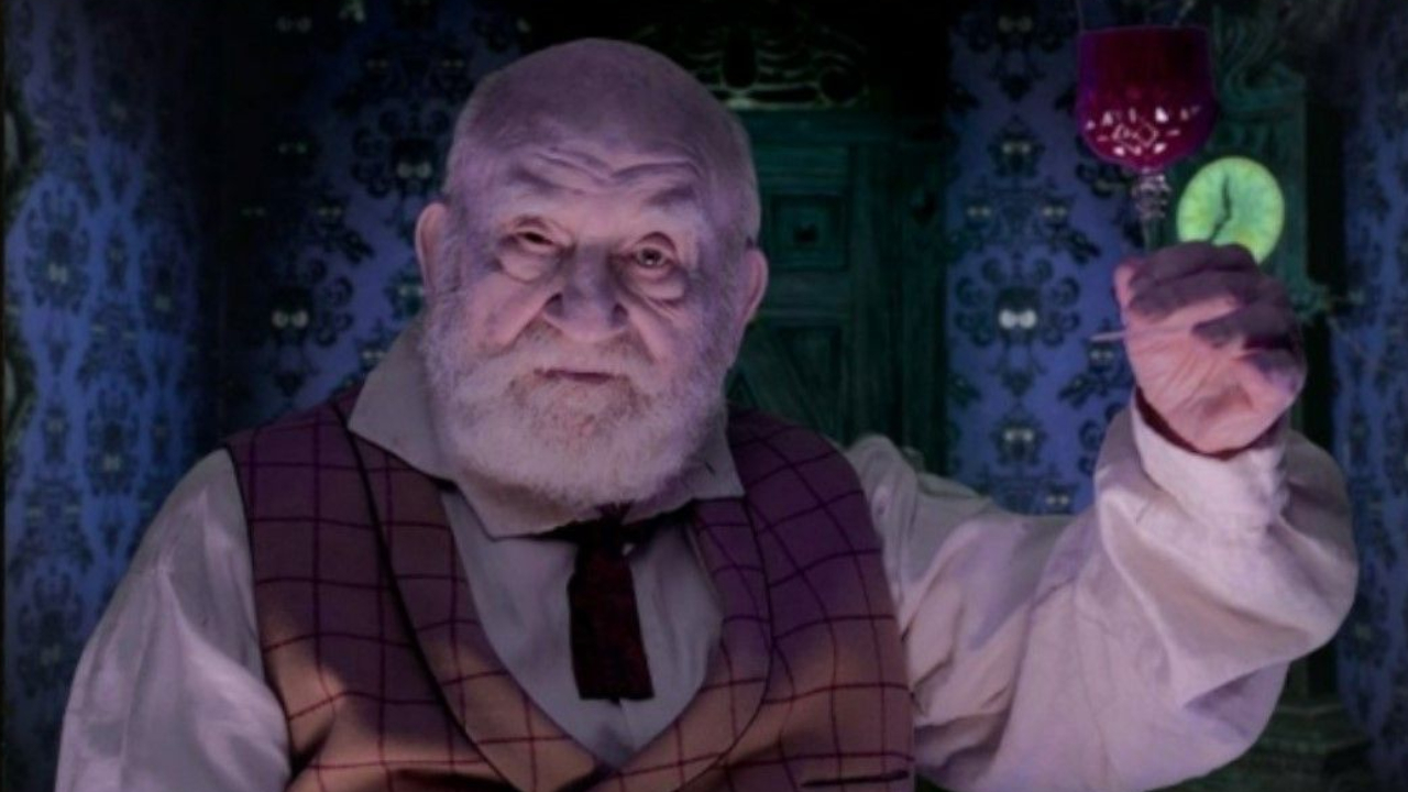 Ed Asner as Claude in Muppets Haunted Mansion