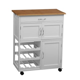 A wooden butchers block on a white wooden frame with casters and assorted drawers and cupboards