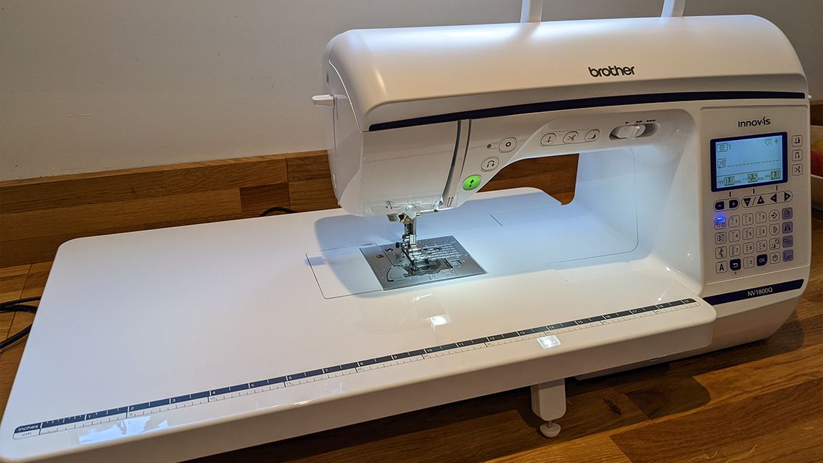 Brother Innovis NV1800Q review, a photo of a sewing machine with its extension table attached