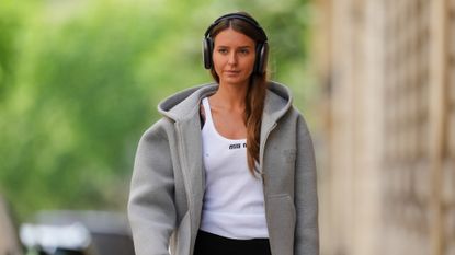 woman wearing a hoodie street style 2024