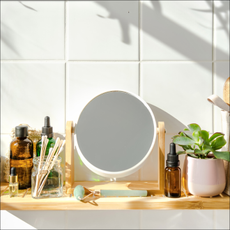 mirror and beauty products on a shelf