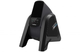 cheap zwift set up can be achived with a regular fan, but in this image is Wahoo's turbo specific fan front right side facing.