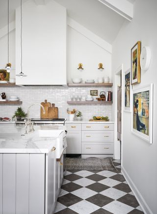 White kitchen with marble checkerboard floor